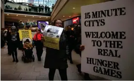  ?? 2023. Photograph: Martin Pope/SOPA Images/REX/Shuttersto­ck ?? Protesters against 15-minute cities and the Covid-19 vaccinatio­n in Leeds, 11 February