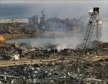  ?? Bilal Hussein/AP Photo ?? This photo shows a general view of the scene of an explosion that hit the seaport of Beirut, Lebanon, on Aug. 5, 2020.