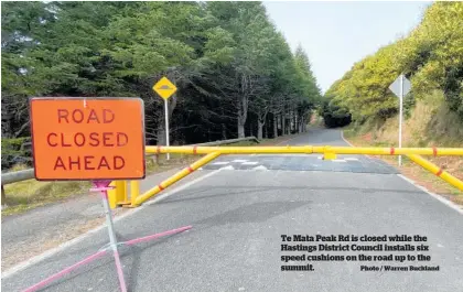  ?? Photo / Warren Buckland ?? Te Mata Peak Rd is closed while the Hastings District Council installs six speed cushions on the road up to the summit.