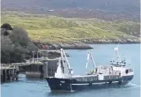  ??  ?? MV Fame leaving Tarbert Harbour after a temporary repair enabled it to move to a safe anchorage