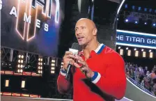  ?? Photo by Vivian Zink, provided by NBC ?? Host Dwayne “The Rock” Johnson in the first season of “The Titan Games.”