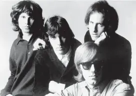  ?? [PHOTO PROVIDED BY ELEKTRA RECORDS] ?? The Doors — from left, singer Jim Morrison, drummer John Densmore, keyboardis­t Ray Manzarek and lead guitarist Robby Krieger — pose for a publicity photo in the 1960s. Fifty years ago, the band released its self-titled debut album.