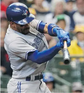  ?? DYLAN BUELL/GETTY IMAGES ?? Blue Jays second baseman Devon Travis has been on an offensive tear, registerin­g 14 doubles in his last 20 games following a dreadful start to the season.