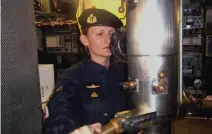  ??  ?? An undated handout picture shows Argentine submarine crew member Eliana Krawczyk onboard the Argentine ARA Salta submarine. (AFP)