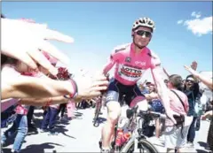  ?? AFP ?? Andre Greipel arrives at the start of the third stage of the 100th Giro d’Italia, from Tortoli to Cagliari in Sardinia, on Saturday.