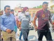  ?? PTI ?? Barjinder Singh Parwana, the main accused in the Patiala violence case, being taken to Mata Kaushalya Hospital for his medical test, in Patiala on Sunday.