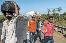  ?? ATUL LOKE/THE NEW YORK TIMES ?? During the past two months under India’s lockdown, millions of migrant laborers and their families have poured out of cities as they try to get back to their native villages.