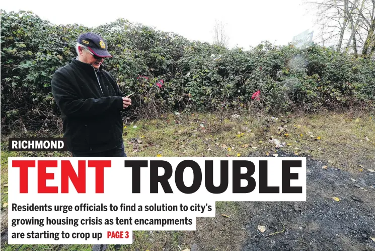  ?? NICK PROCAYLO/PNG ?? Ted Lee examines the remaining damage left by a homeless camp near his home in East Richmond’s Hamilton area. The city recently cleaned up the site.