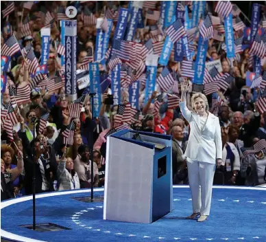  ?? AP Photo/John Locher ?? Democratic presidenti­al candidate Hillary Clinton takes the stage Friday during the final day of the Democratic National Convention in Philadelph­ia.