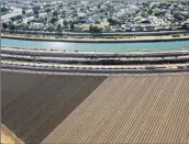  ?? Brian van der Brug Los Angeles Times ?? THE ALL-AMERICAN CANAL, shown in Calexico, brings Colorado River water to the Imperial Valley.