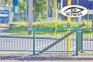  ?? Picture: ELIKI NUKUTABU ?? Part of this broken railings lies against the crossing at the junction at Ratu Mara Rd and Princess Rd at Samabula in Suva.