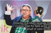  ??  ?? Director Erik Matti receives the Coppa Volpi for best actor on behalf of John Arcilla.