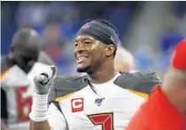  ?? PAUL SANCYA/AP ?? Quarterbac­k Jameis Winston celebrates after the Buccaneers’ victory over the Lions on Sunday in Detroit.