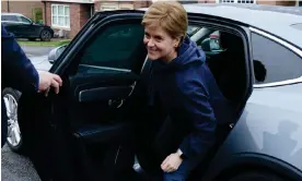  ?? Andrew Milligan/PA ?? Nicola Sturgeon arrives home after announcing her departure as first minister. Photograph: