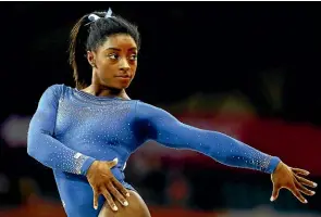  ?? GETTY IMAGES ?? Simone Biles in action during the floor exercise competitio­n at the World Artistic Gymnastics Championsh­ips.