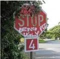  ?? Pictures: Rogan Ward ?? A stop sign, above, and a bus stop, below, with graffiti near the Ballito home where a neighbour threw bags of paint on to the driveway.