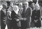  ?? MATT ROURKE/ AP ?? Buffalo Mayor Byron Brown, left, New York Gov. Kathy Hochul, Sen. Kirsten Gillibrand, D- N. Y., Senate Majority Leader Chuck Schumer and New York Attorney General Letitia James meet with President Joe Biden and first lady Jill Biden on Tuesday at the site of Saturday’s mass shooting.