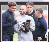  ??  ?? GOALS ON FILM Dele Alli, James Tarkowski and Kieran Trippier during training yesterday