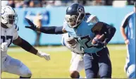  ?? John Amis / Associated Press ?? Titans running back Derrick Henry plays against the Colts on Monday.