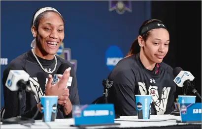  ?? SEAN D. ELLIOT/THE DAY ?? South Carolina’s A’ja Wilson, left, answers questions from the media on Sunday as teammate Alexis Jennings, right, looks on at the Times Union Center in Albany, N.Y.