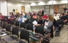  ??  ?? A crowd of about 35 people showed up at Thursday’s Upper Perkiomen School Board meeting to learn more about the mold problem that closed the high school for a week.