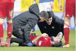  ??  ?? NOT AGAIN May feared long-term injury after foul by Gers midfielder Jack