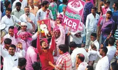  ?? AP ?? Supporters of Telangana Rasthtra Samathi (TRS) celebrate in Hyderabad yesterday following their landslide win in polls.