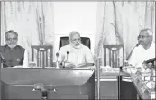  ??  ?? PM Narendra Modi with Bihar CM Nitish Kumar (R) and Dy CM Sushil Kumar Modi during a flood review meeting