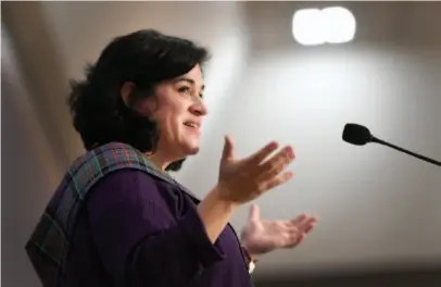  ?? CITIZEN PHOTO BY BRENT BRAATEN ?? Joanna Kelly speaks at her father Dr. Bert Kelly’s Celebratio­n of Life on Friday at the Prince George Civic Centre. Dr. Kelly, a longtime advocate for healthcare in the north, passed away on Dec. 12.