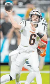  ?? John Raoux The Associated Press ?? Bengals quarterbac­k Jake Browning threw for 354 yards and won a game as a starter for the first time since his senior year at Washington in 2018.