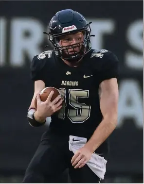  ?? (Arkansas Democrat-Gazette/Colin Murphey) ?? Harding quarterbac­k Cole Keylon (left) runs the ball against Ouachita Baptist on Oct. 14 at First Security Stadium in Searcy. The Bisons (7-0, 7-0 Great American Conference) face Southern Arkansas (6-1, 6-1) at 2 p.m. today at Memorial Stadium in El Dorado.