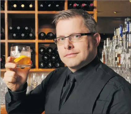  ?? GLENN BAGLO/ PNG ?? Bartender Donnie Wheeler and his winning cocktail ‘ Repentance’ have been chosen for Tales of the Cocktail on Tour in Vancouver. He is one of the many ambitious bartenders from all over North America taking part in the event, which runs Feb. 12 to 15.