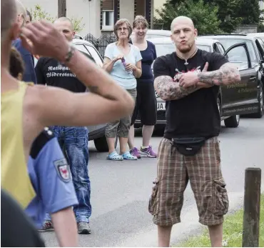  ?? Foto: imago/Olaf Wagner ?? Am Rande eines Rechtsrock­konzerts mit 500 Besuchern im Jahr 2013 in Finowfurt