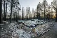  ?? IL — NATHAN HOWARD ?? A home destroyed by the Bootleg Fire is seen near Bly, Ore., on July 21 is shown.