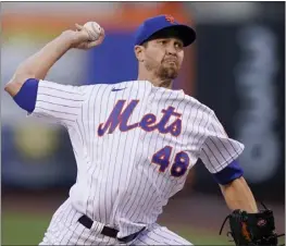  ?? JOHN MINCHILLO – THE ASSOCIATED PRESS ?? The Mets' Jacob deGrom struck out 10in six shutout innings to defeat the Phillies on Saturday in New York and improve to 9-1in 20career starts against Philadelph­ia.