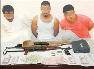  ??  ?? The three suspects arrested in connection with the robbery and shooting death of two Indian security guards
in Sulaibiya vegetable market about 16 days ago.