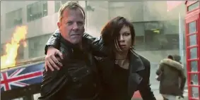  ??  ?? SAVING THE WORLD: Jack Bauer (Kiefer Sutherland) and Chloe O’Brian (Mary Lynn Rajskub) hit London.