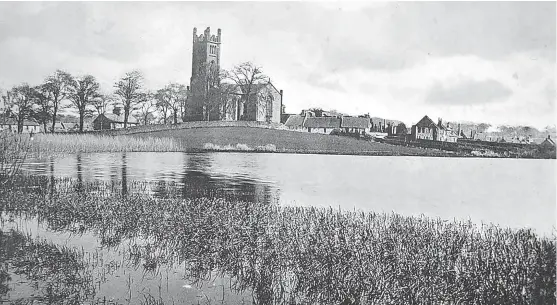  ??  ?? This postcard shows Kilconquha­r and the church from the loch. The card was posted in 1920.