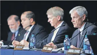  ?? LUIS SANCHEZ SATURNO, AP ?? Sean Sullivan, right, chairman of the Defense Nuclear Facilities Safety Board, has advocated shrinking or closing the safety board.