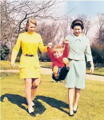  ??  ?? Davis, below; left, his photograph of the Queen and Princess Anne swinging a young Prince Edward in the grounds of Frogmore, Windsor in 1968, and, right, Princess Margaret at Quaglino’s restaurant in 1961: ‘She really was the Diana of her day’