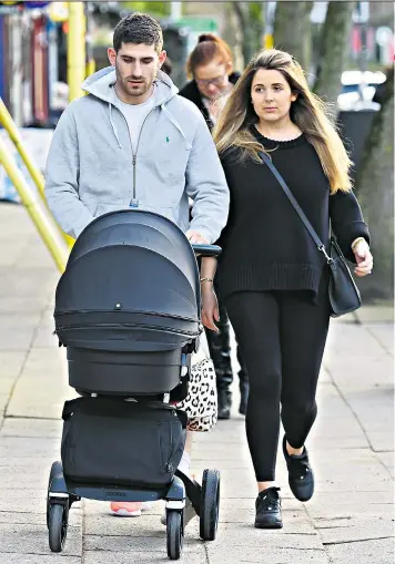  ??  ?? The couple out and about in Alderley Edge in February, shortly after the birth of their son