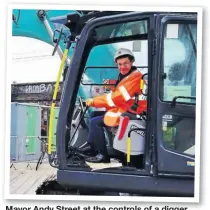  ?? PHOTOS SUPPLIED ?? Mayor Andy Street at the controls of a digger. digger