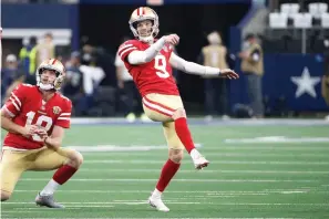 ?? AP Photo/Roger Steinman, File ?? San Francisco 49ers kicker Robbie Gould (9) warms up with Mitch Wishnowsky (18) Sunday before an NFL wild-card playoff football game against the Dallas Cowboys in Arlington, Texas. Coach Kyle Shanahan has a simple request for the San Francisco 49ers special teams units each week. With a dynamic offense and fearsome pass rush leading a stout defense, he just wants to avoid catastroph­es in the kicking game.