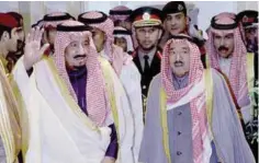  ??  ?? Saudi King Salman Bin Abdulaziz Al Saud waves as he arrives to the venue.