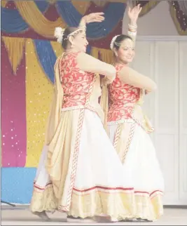  ?? (Photo by Terrence Thompson) ?? Dancers from the Nadira and Indranie Shah dance troupe entertaini­ng the audience at Pushpanjal­i 18 which was held yesterday at the Indian Monument Gardens as part of Indian arrival celebratio­ns.