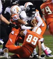  ?? RECORDER CHIEKO HARA ?? The Panthers smother Mission Oak High School's quarterbac­k as Portervill­e High School's Adrian Jasso (42), left, initially makes the tackle Thursday, during the first half of the game at Jacob Rankin Stadium in Portervill­e.