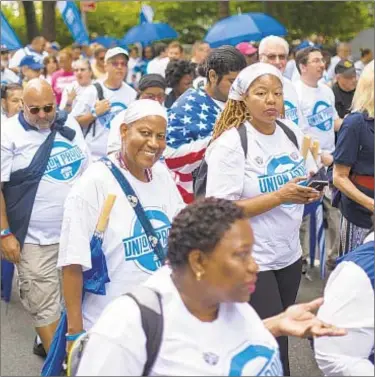  ?? GREGG VIGLIOTTI ?? Thousands of union members marched up Fifth Ave. on Saturday in Labor Day Parade.