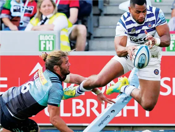  ?? PICTURE: Getty Images ?? Agility: Joe Cokanasiga avoids touch to score against Quins