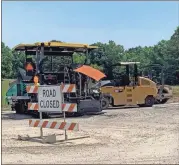  ??  ?? Above: Roadwork equipment off Ga. 53 is placed at the west end of what will be the South Calhoun Bypass. Left: This picture shows the start of the South Calhoun Bypass off Ga. 53.