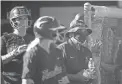  ?? THOMAS HAWTHORNE/THE REPUBLIC ?? Hamilton softball coach Rocky Parra, right, watches a game against Caseteel at Hamilton High School in Chandler on April 12.